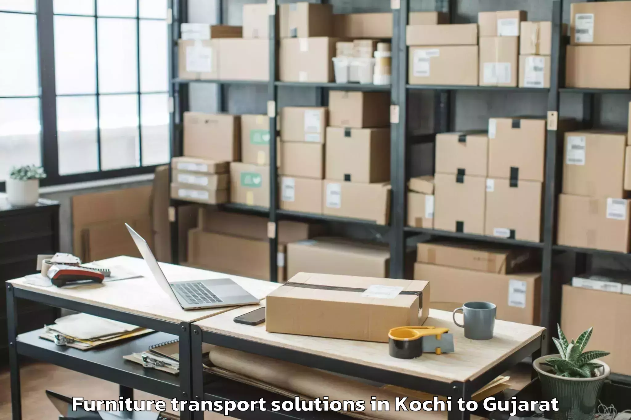 Professional Kochi to Vaghodia Ina Furniture Transport Solutions